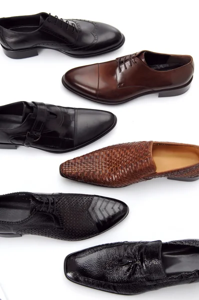 Verschillende mannen schoenen geïsoleerd op wit — Stockfoto