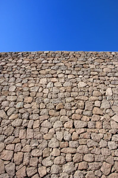 Фон стены неба и камня — стоковое фото
