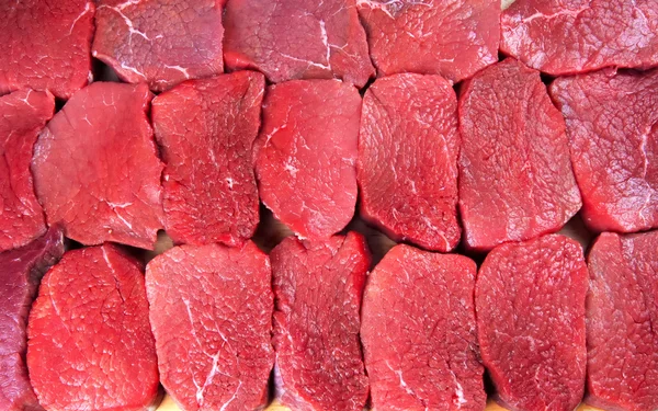 Stuk van verse rauwe vlees achtergrond — Stockfoto
