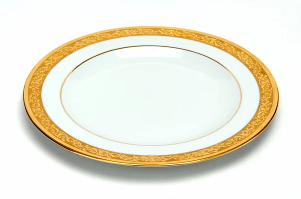 Altmodische weiße Platte mit goldenem Vintage-Ornament — Stockfoto