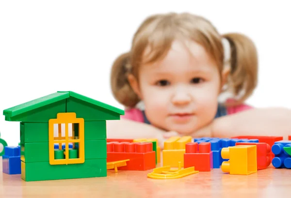 The beautiful girl with toy blocks — Stock Photo, Image