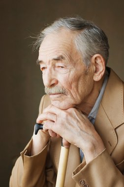 Old man with moustaches in a jacket clipart