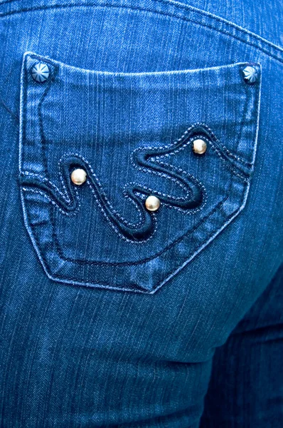 Back pocket at dark blue jeans — Stock Photo, Image