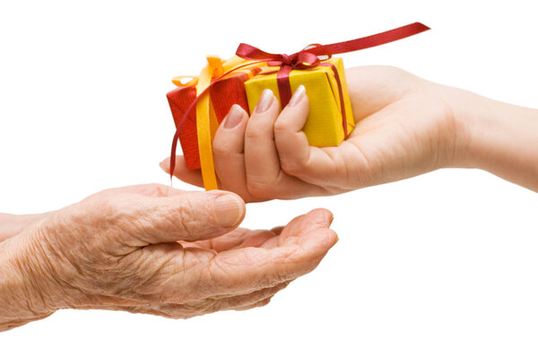 To hand a gift isolated on white