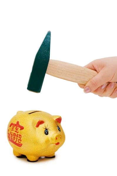 Mão com martelo e porquinho — Fotografia de Stock