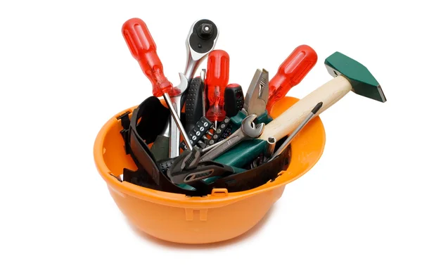 Bygga verktyg i ett orange hjälm — Stockfoto