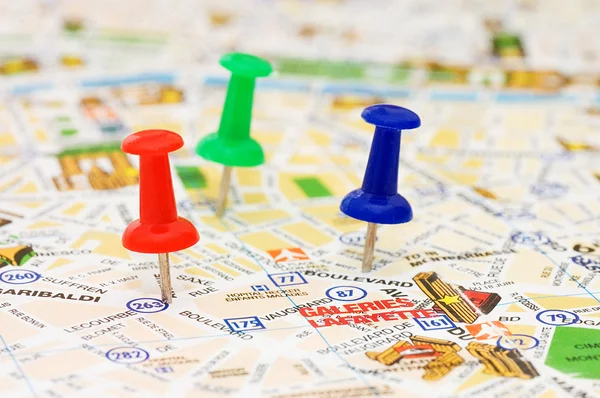 Color pushpins marking a location — Stock Photo, Image