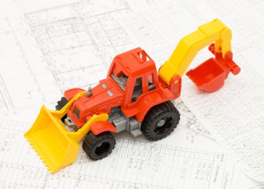projeler üzerinde oyuncak sarı traktör