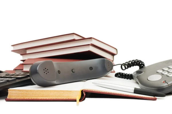 Telefone, caneta e notebook isolados — Fotografia de Stock