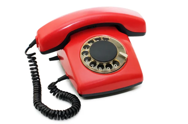 Червоний старий телефон ізольований на білому — стокове фото