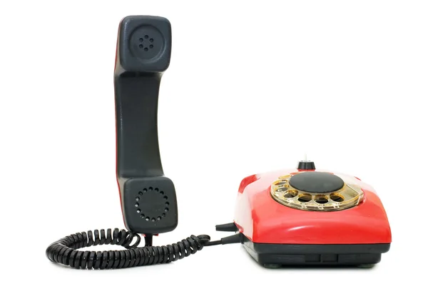 Czerwony stary telefon na białym tle — Zdjęcie stockowe