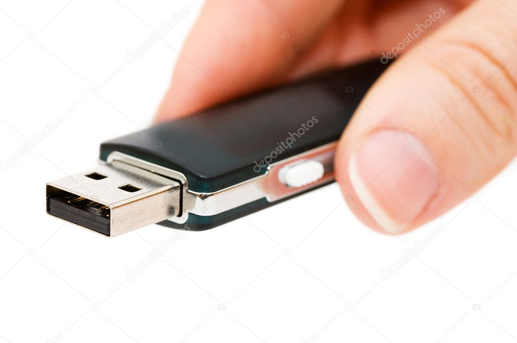 Flash drive in hand isolated on white