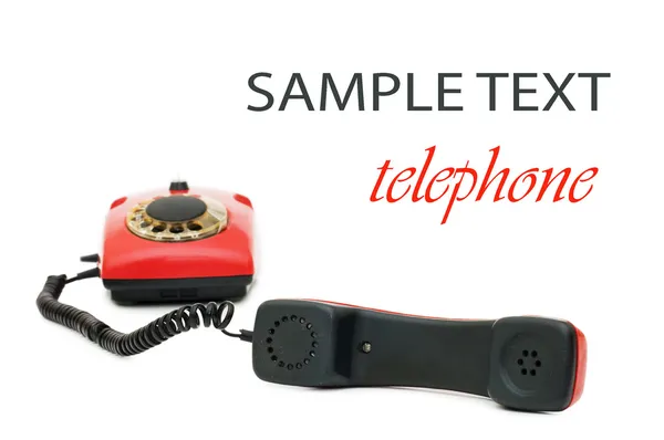 Vieux téléphone rouge isolé sur blanc — Photo