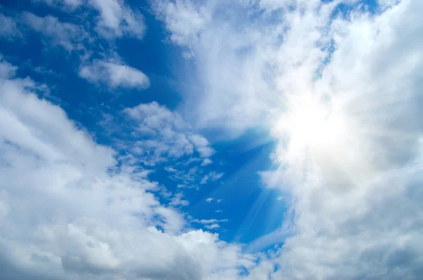 Beauty blue sky clouds and sun — Stock Photo, Image