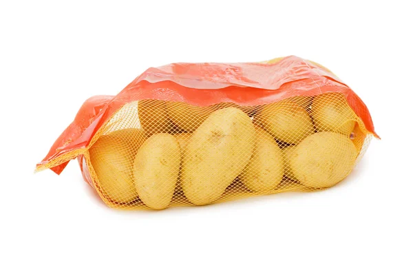 Patata en una bolsa aislada en blanco —  Fotos de Stock