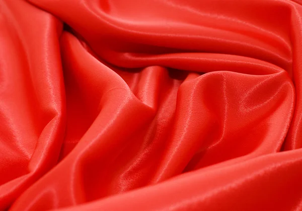 Элегантный и мягкий красный атласный фон — стоковое фото