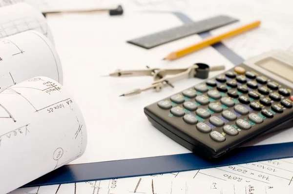 Pencil on clipboard and the calculator — Stock Photo, Image