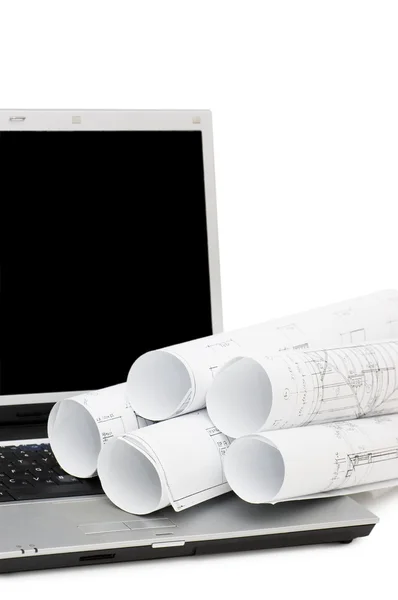 Planos e laptop isolado em branco — Fotografia de Stock