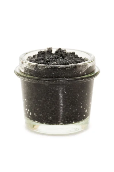 Black caviar in a glass jar on a white — Stock Photo, Image