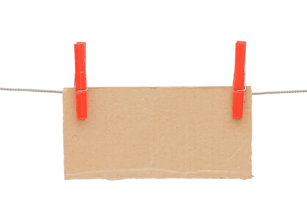 La tableta de cartón cuelga de un cordón — Foto de Stock