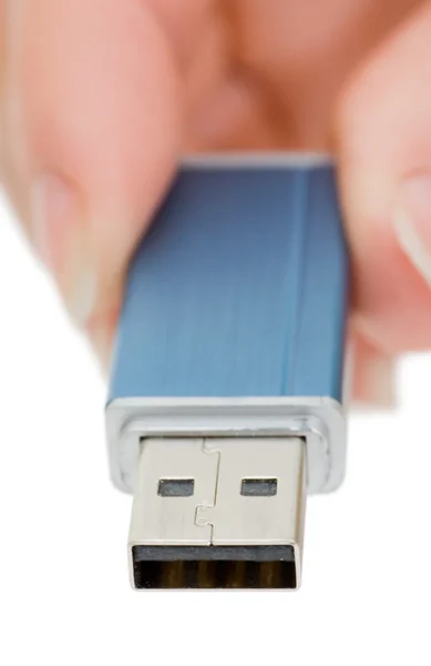 Flash drive na mão isolado em branco — Fotografia de Stock