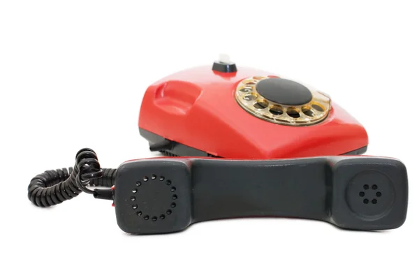 Червоний старий телефон ізольований на білому — стокове фото