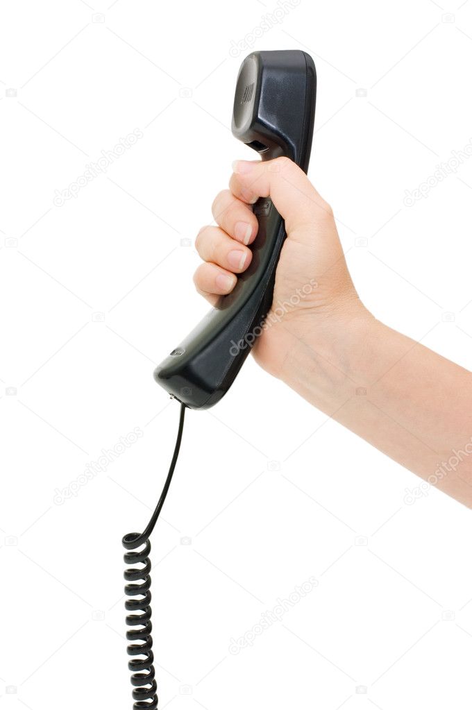Telephone receiver in hand isolated