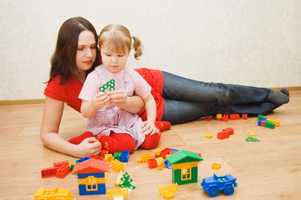 Mum with the daughter play to a room — Stock Photo, Image