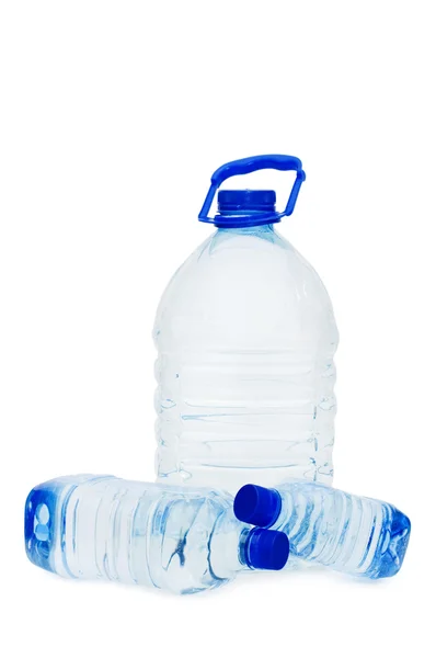Flessen water geïsoleerd op de witte achtergrond — Stockfoto
