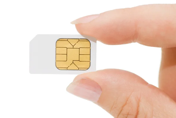 stock image Sim card In a hand isolated on white background