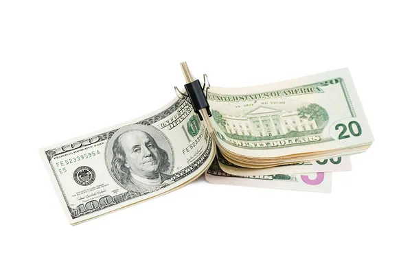 Embalar dólares isolados no fundo branco — Fotografia de Stock