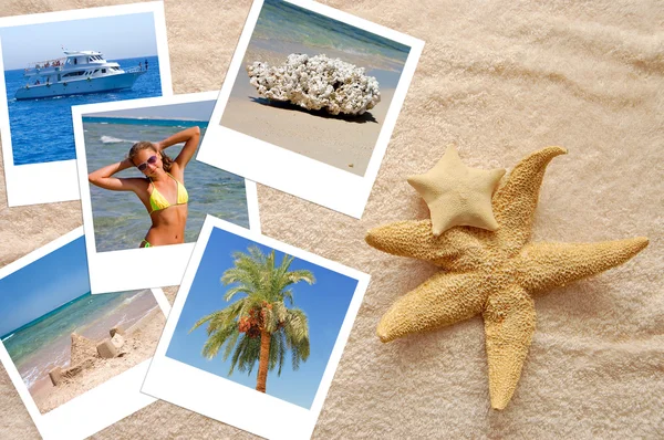 Two starfishes and photos on a beach towel — Stock Photo, Image