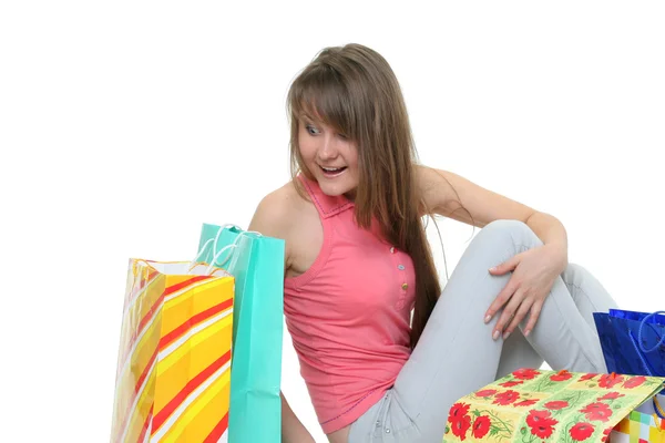 The beautiful girl with purchases — Stock Photo, Image