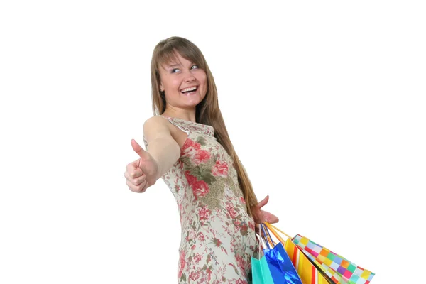 Красивая девушка с покупками — стоковое фото