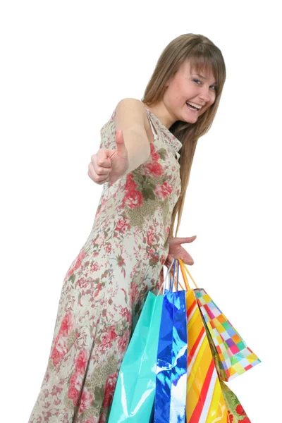 The beautiful girl with purchases Stock Image