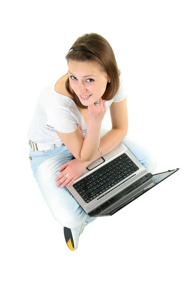 A bela menina com o computador portátil — Fotografia de Stock