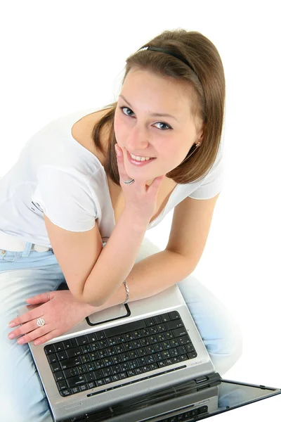 A bela menina com o computador portátil — Fotografia de Stock
