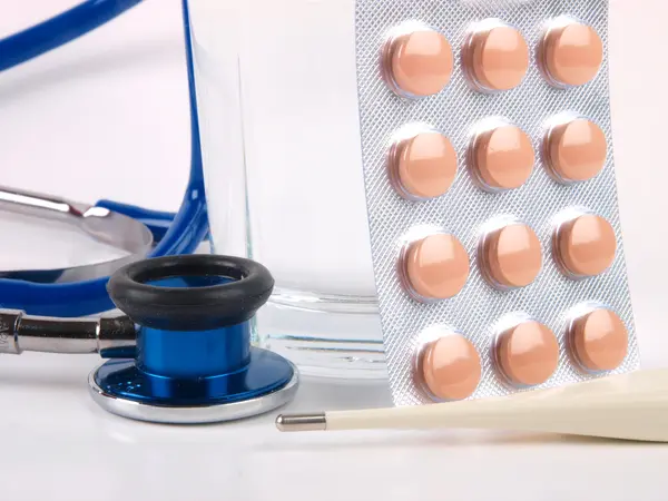 stock image Pills on doctors table