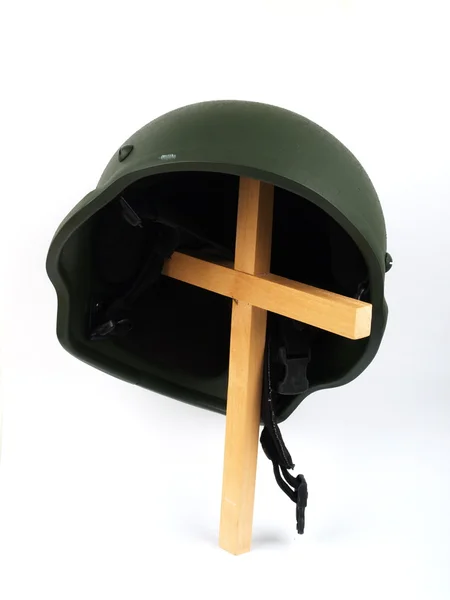 Military helmet on a cross — Stock Photo, Image
