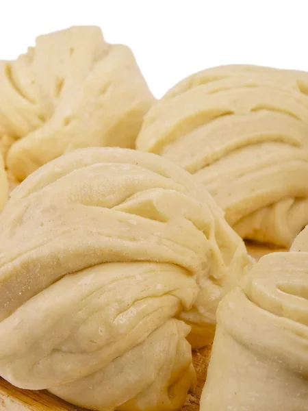 stock image Chinese steamed roll. Close up on white background