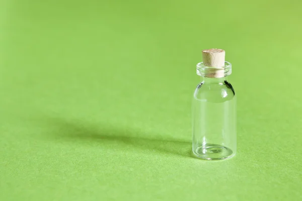 Tiny glass bottle — Stock Photo, Image