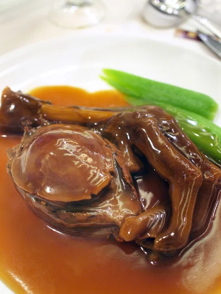 Braised duck feet and abalone — Stock Photo, Image