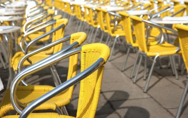 Yellow cafe chairs in San Marco Piazza clipart