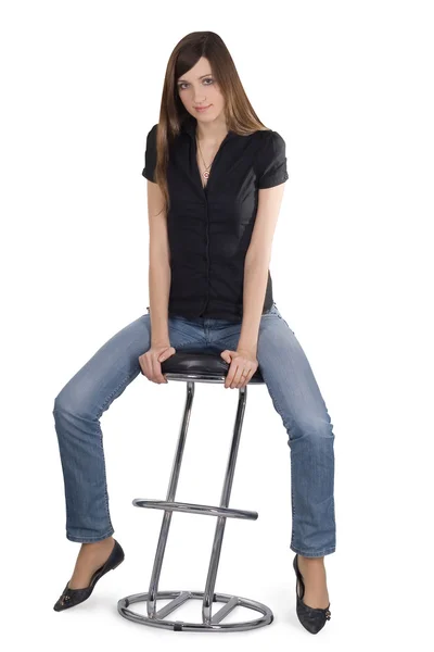 Žena sedí na židli — Stock fotografie