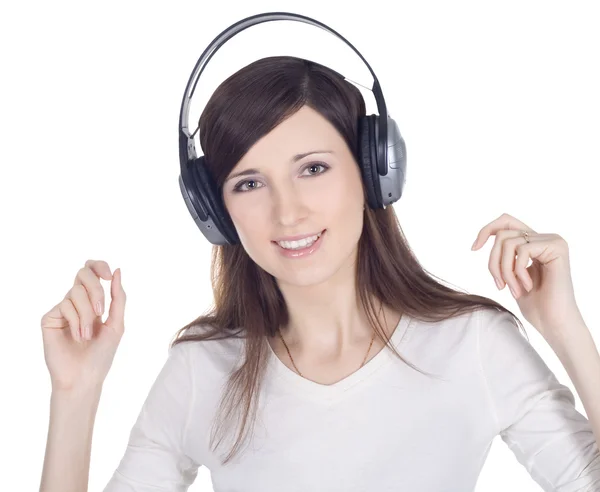Młoda kobieta w słuchawkach, słuchanie muzyki — Zdjęcie stockowe