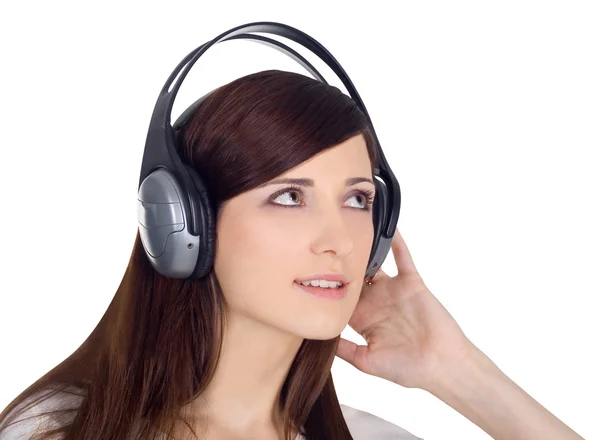 Mujer joven en auriculares escuchando música —  Fotos de Stock