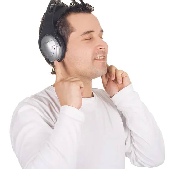Hombre emocional en auriculares escuchando música — Foto de Stock