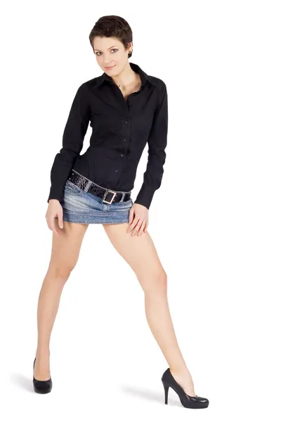 Lovely brunette in denim skirt — Stock Photo, Image