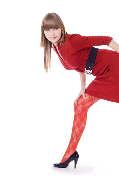 Frau in rotem Kleid über weißem — Stockfoto
