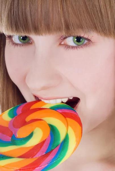 Hungry blonde with color lolli — Stock Photo, Image
